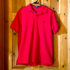 Ralph Lauren Polo size Medium true red with a navy polo symbol like new